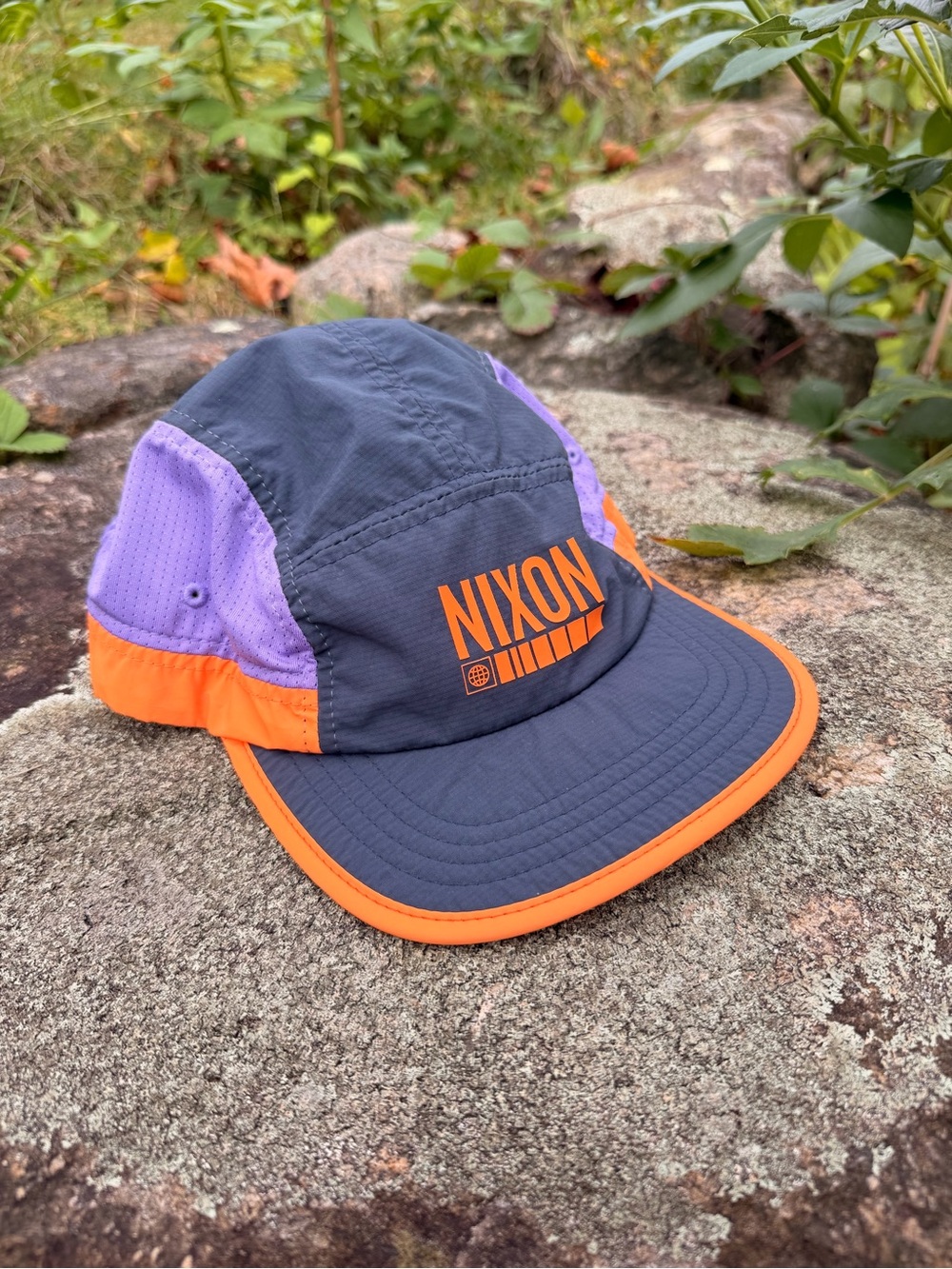 Nixon hat with Purple Panels & Orange Trim